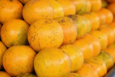 Close-up of oranges for sale at market stall