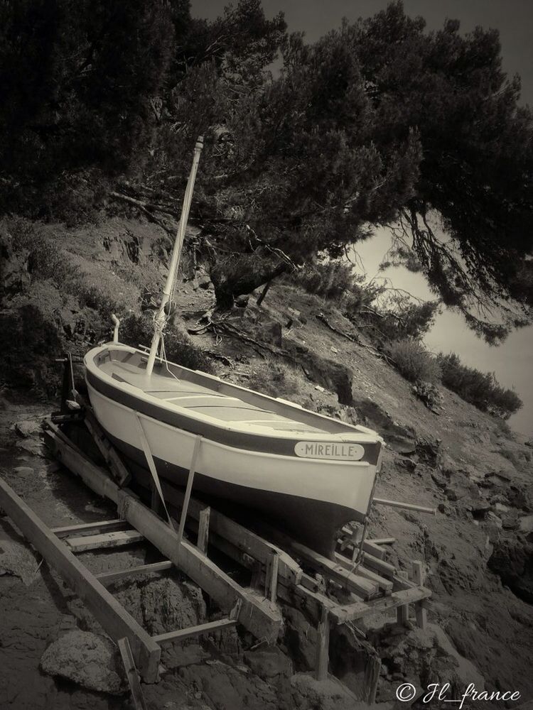 nautical vessel, boat, moored, transportation, water, mode of transport, tranquility, nature, tranquil scene, high angle view, mountain, lake, day, outdoors, no people, river, tree, absence, beauty in nature, non-urban scene