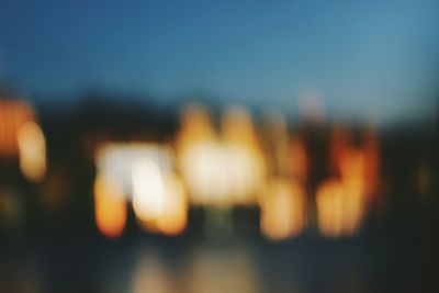 Defocused image of illuminated lights at night