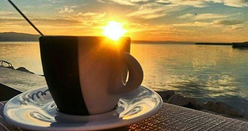 Sun shining over sea