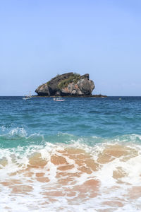 Scenic view of sea against clear sky