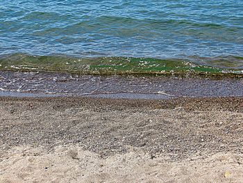 High angle view of pebbles on beach