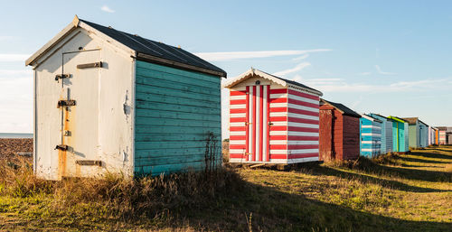 House on field against sky