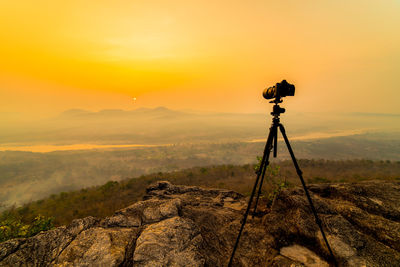 Scenic view of landscape against sky during sunset