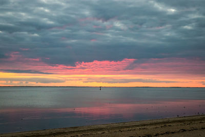 View of calm sea at sunset