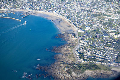 High angle view of city by sea