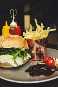 Close-up of fresh vegetables in plate on table