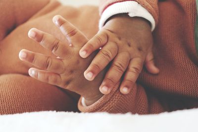 Midsection of woman with hands