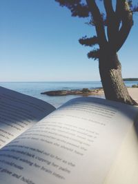 Scenic view of sea against blue sky