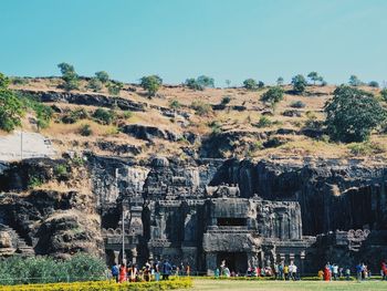 Group of people in front of built structure