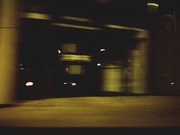 Blurred motion of illuminated car at night