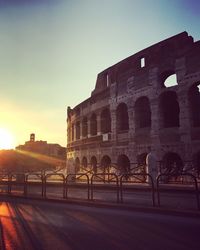 View of historic building against sky during sunset