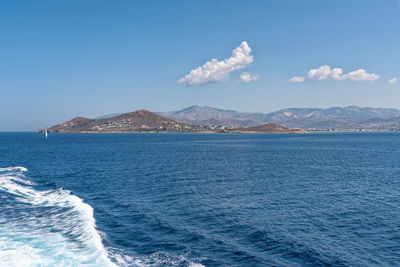 Scenic view of sea against blue sky