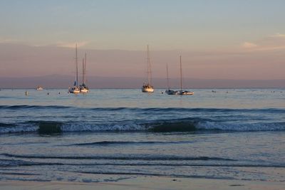 Boats sailing in sea