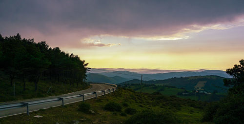 Scenic view of mountains against sky during sunset