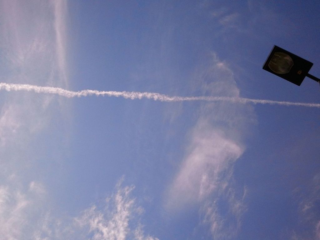 blue, low angle view, sky, scenics, beauty in nature, cloud - sky, nature, tranquility, tranquil scene, cloud, copy space, idyllic, day, no people, outdoors, sunlight, sky only, vapor trail, cloudscape, majestic