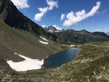 Scenic view of landscape and mountains against sky