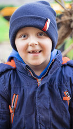 Portrait of boy standing outdoors