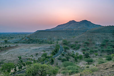 Scenic view of landscape against sky during sunset