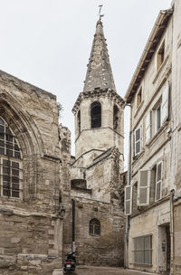 Low angle view of old building against sky