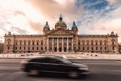 View of building against cloudy sky