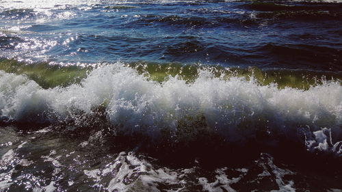 High angle view of water splashing in sea