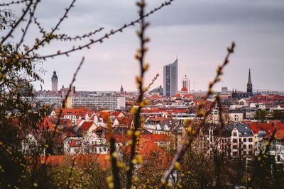 Modern buildings against sky in city