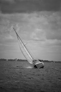 Boat in sea against sky