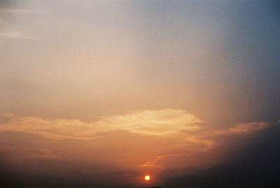 Low angle view of dramatic sky during sunset