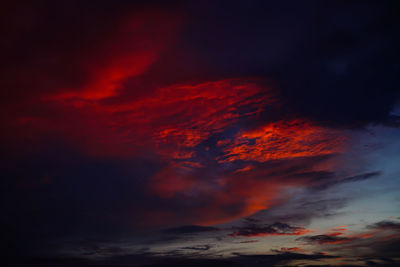 Low angle view of dramatic sky at sunset