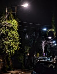 View of illuminated street at night