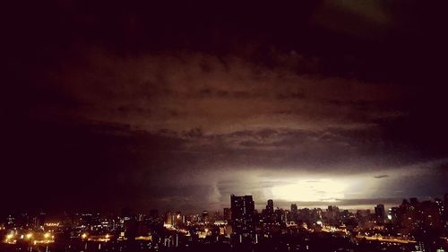 Illuminated cityscape at night