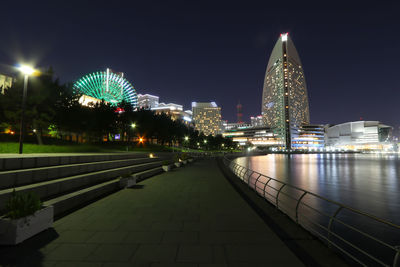 Illuminated city buildings at night