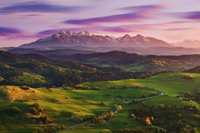 Scenic view of landscape against sky during sunset