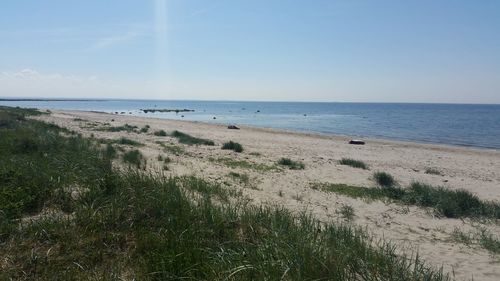 Scenic view of sea against clear sky