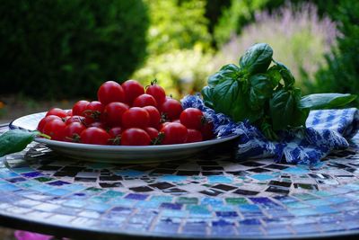 Close-up of fruits in plate on table