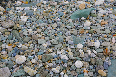 Full frame shot of pebbles on beach