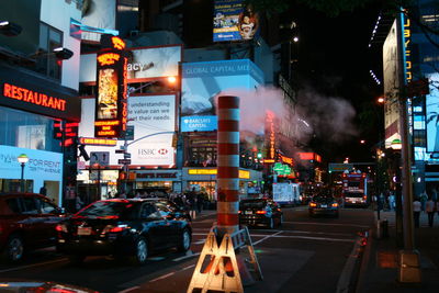 Traffic on city street at night