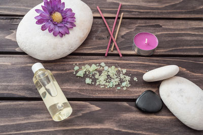 Close-up of flowers on wooden table