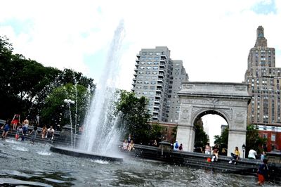 Tourists enjoying fountain