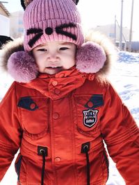 Full length of cute baby girl during winter