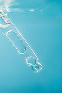 Close-up of dental equipment on blue background