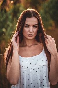 Portrait of young woman looking away