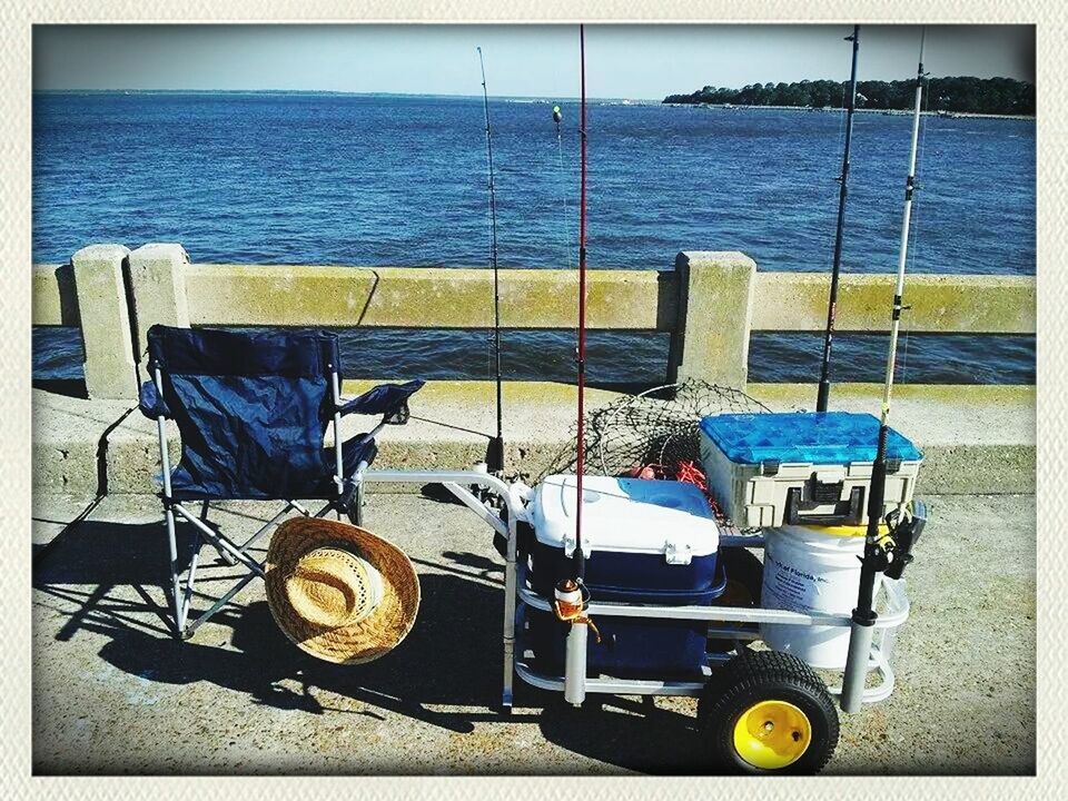 transfer print, transportation, mode of transport, auto post production filter, water, nautical vessel, sea, boat, moored, sky, travel, land vehicle, sunlight, outdoors, day, men, bicycle, nature, stationary