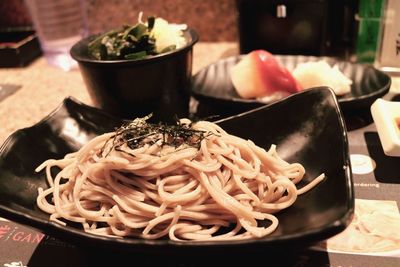 Close-up of noodles in bowl on table