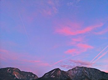 Scenic view of mountains against sky during sunset