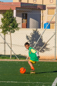 Boy playing with ball