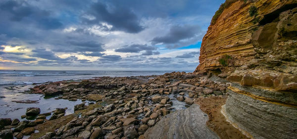 Scenic view of beach against sky