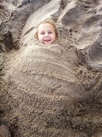 High angle portrait of cute smiling boy outdoors