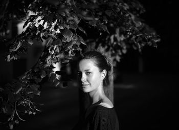 Portrait of young woman looking away